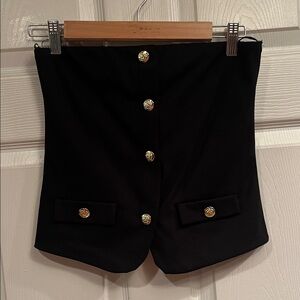 Elegant Black Sleeveless Top with Gold Accents